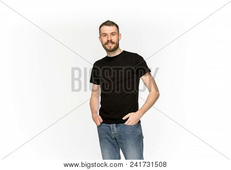 Closeup Of Young Man's Body In Empty Black T-shirt Isolated On White Background. Mock Up For Disign 