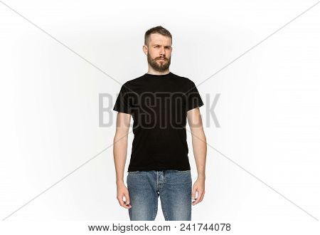 Closeup Of Young Man's Body In Empty Black T-shirt Isolated On White Background. Mock Up For Disign 