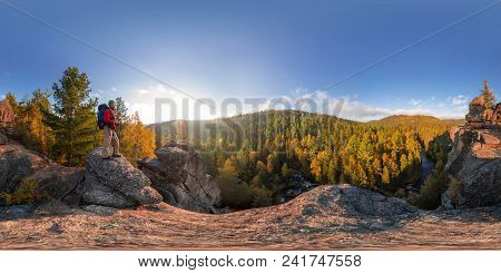 Backpacker On Top Of A Rock Fall At Dawn. Spherical Panorama 360 180 Degrees Equidistant.