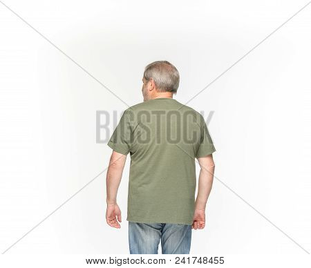 Closeup Of Senior Man's Body In Empty Green T-shirt Isolated On White Background. Mock Up For Disign