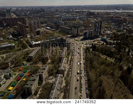 Forest In The Novosibirsk City,siberia With Diffrent Trees And Plants With Some Buildings In It. Str