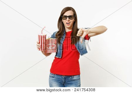 Portrait Of Young Dissatisfied Woman In 3d Glasses Watching Movie Film, Holding Bucket Of Popcorn An