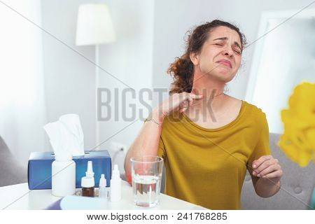Metal Intolerant. Young Housewife Wearing Necklace Feeling Discomfort And Pain Discovering It Causes
