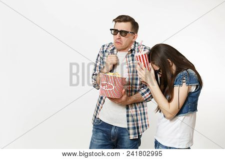 Young Disgusted Couple, Woman And Man In 3d Glasses Watching Movie Film On Date, Holding Bucket Of P