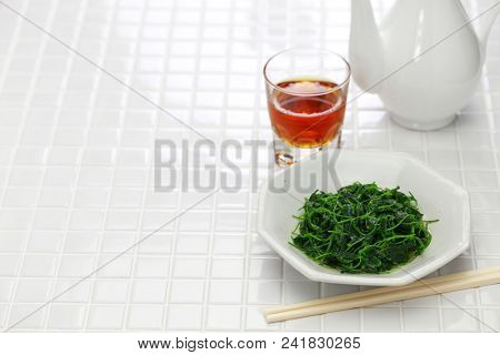 chinese white wine stir fried with toothed bur clover, shanghai cuisine