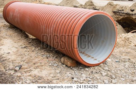 Large Orange Plastic Pipes For Sewerage System.