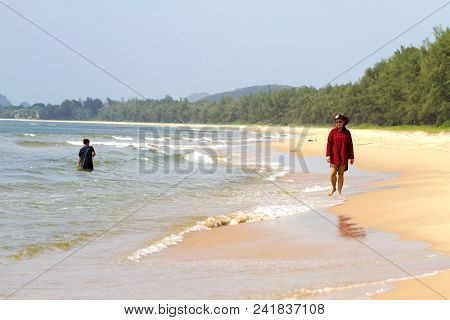 Woman Outdoor With Sunshine And Hat On Beach At Bang Beot Beach, Chumphon Province Thailand
