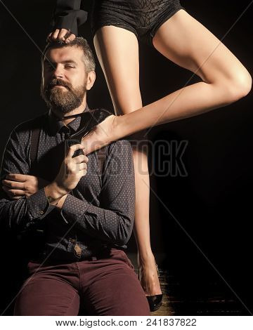 Sexy Couple. Man At Table With Female Legs. Man In Shirt Isolated On Black Background, Matriarchy. L