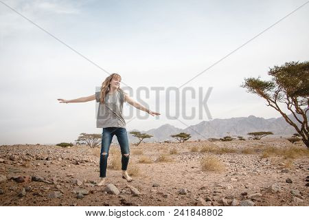 Girl Have Fun In Desert In A Summer Day