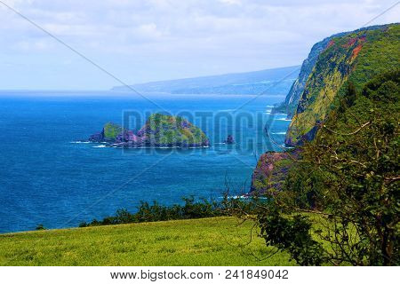 Mountains Meeting The Sea With Lush Plants And Fields Taken At Pololu Valley In The Big Island Of Ha