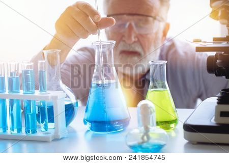 Chemistry Professor Scientist In Science Chemical Lab To Testing New Medical Formular