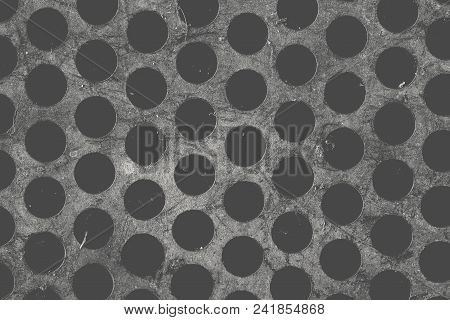 Round-hole Grid Close-up As A Industrial Textured Background.