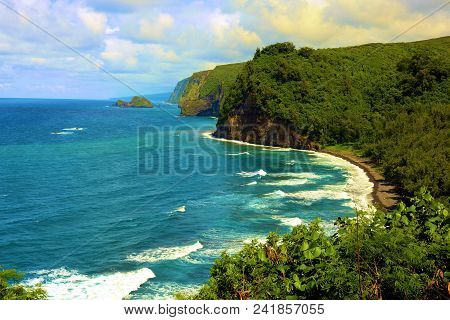 Waves Crashing Onshore To A Rural Beach Surrounded By A Lush Tropical Rain Forest Taken At Pololu Va