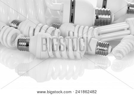 Compact, Fluorescent, Energy-saving Light Bulbs Of Different Power, Isolated On White Background
