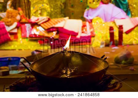 Lit Brass Lamp On Top Of A Brass Stand Or Worship Idol Durgapuja India Diwali