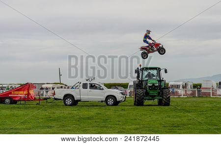 Anglesey, Uk: Feb 20, 2018: The Kangaroo Kid Display Team Perform Stunts Using A Quad Bike At The An
