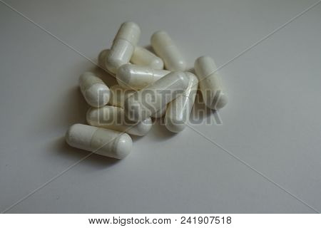 Magnesium Citrate Dietary Supplement Capsules In A Heap