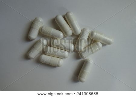 White Capsules Of Magnesium Citrate From Above