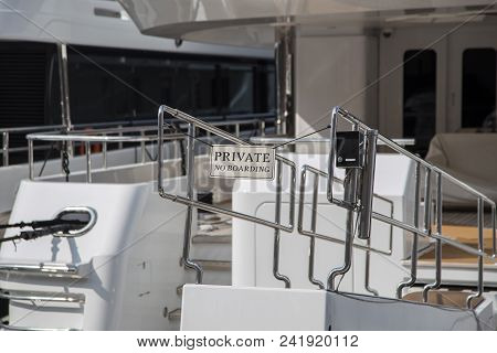 Private Gangplanks And Access To Luxury Yachts With Signboards And Electronic Control Panels Leading