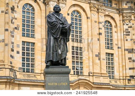 DRESDEN, GERMANY - JULY 17, 2017: Martin Luther memorial statue near Frauenkirche in Dresden, german theologian leader of the Protestant Reformation and translated Bible to German language