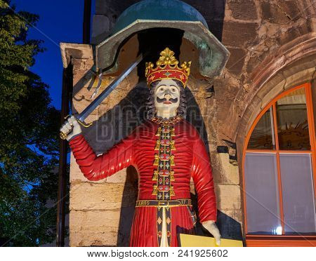 NORDHAUSEN, THURINGIA/GERMANY - JULY 13, 2017: Roland landmark figure is a medieval knight symbolized the imperial freedom from 1220 to 1802 located at Stadt Nordhausen Rathaus