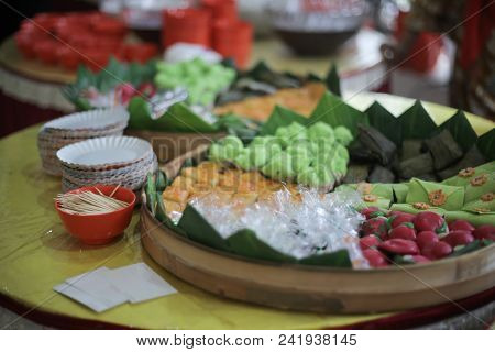 Cake Kue Tok, Bolu Kukus, Sticky Glutinous Rice Mixed With Meat Packed Inside Banana Leaf Is Traditi