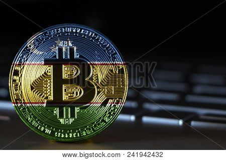 Bitcoin Close-up On Keyboard Background, The Flag Of Karakalpakstan Is Shown On Bitcoin.