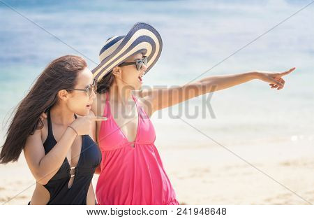 Summer Lifestyle Of Two Women Friends Having Fun And Happy On Beach. Positive Emotions. Summer Conce