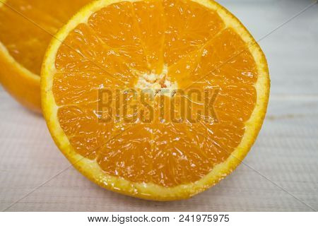 Glass Of Fresh Orange Juice,ripe Orange Fruit And Slices On Rustic Wooden Table.freshly Squeezed Ora