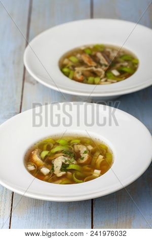 Bavarian Pancake Soup In Plates On Wood