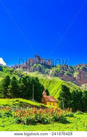 View On Rough Mountains And Green Meadows By Alpe Di Siusi In South Tyrol