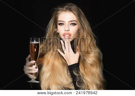 Romantic Woman With Long Hair, Professional Makeup, Sensual Lips Hold Glass Of Champagne. Sexy Woman