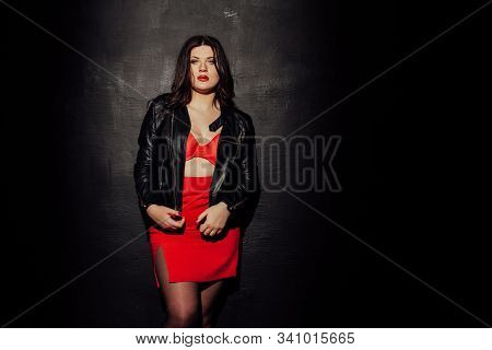 Fat Woman In Red Underwear In Black Room