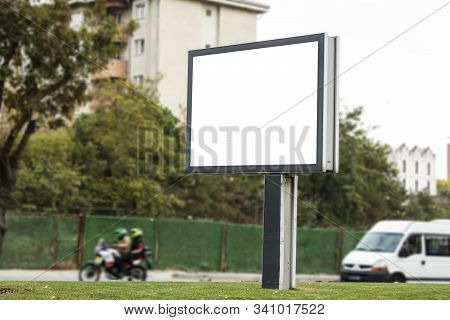 Close-up Advertising Sign. In White Background. Photographed On A Autumn Day.
