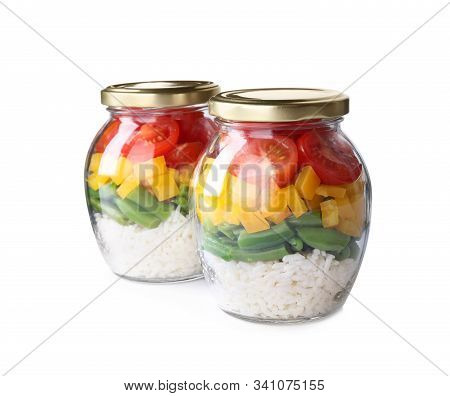 Glass Jars With Healthy Meal Isolated On White