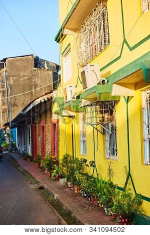 Panaji, India - December 15, 2019: A Narrow Lane Surrounded By Colorful Portuguese Houses In Panjim,