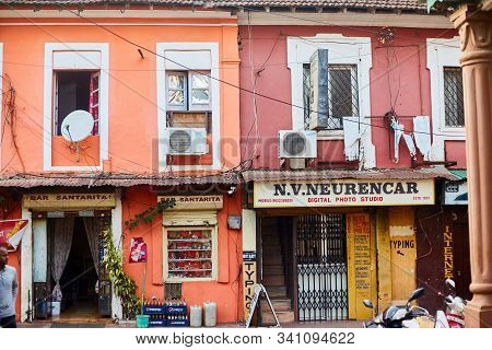 Panaji, India - December 15, 2019: A Narrow Lane Surrounded By Colorful Portuguese Houses In Panjim,