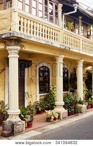 Panaji, India - December 15, 2019: A Narrow Lane Surrounded By Colorful Portuguese Houses In Panjim,