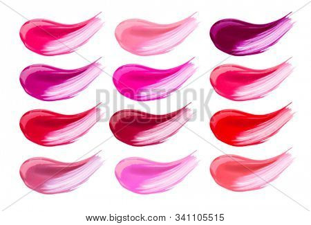 Lip gloss face make-up samples palette. Set of colorful cosmetic liquid lipgloss in different colour smudge smear strokes. Make up smears isolated on a white background. Lipstick colors
