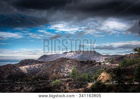 Los Angeles, Ca, Usa - October 28, 2016: Hollywood Sign Under Dark Clouds