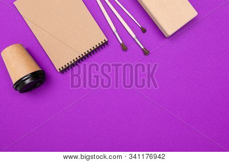 Drawing Set Sach As Brushes, Note, Scetchbook, Paints, Oil And Cup Of Coffee Isolated On Blue Backgr