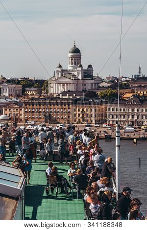 Editorial 06.19.2019 Helsinki Finland Car Ferry Silja Serenade Leaving Port With Passengers On Deck 