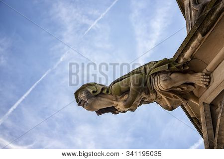 Ulm, Germany - July 20, 2019: Grotesque Gargoyle At The Gothic Tower A Part Of The Cathedral In City