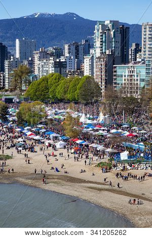 Downtown Vancouver, British Columbia, Canada - April 20, 2019: Aerial View Of Crowd Of People Gather