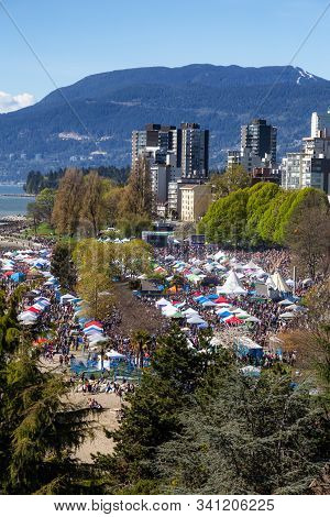 Downtown Vancouver, British Columbia, Canada - April 20, 2019: Aerial View Of Crowd Of People Gather