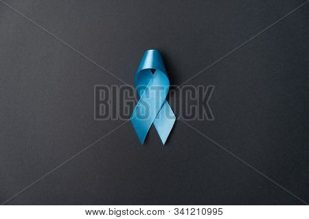 Symbol For Support Men. Blue Ribbon On Grey Background. Prostate Cancer Awareness, Movember Men's He