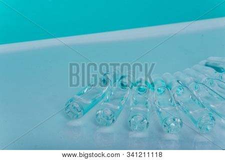Glass Medical Ampoule Vial For Injection. Medicine Is Liquid Sodium Chloride With Of Aqueous Solutio