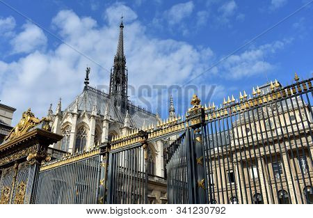 The Sainte Chapelle Gothic Landmark Exterior With Famous Spire. Paris, France.