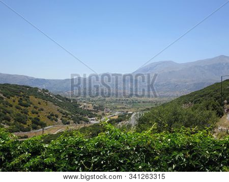 Beautiful Panorama Of Stone Mountains, Trees And Blue Sky