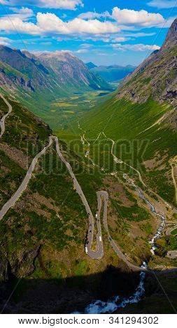 Trolls Path Trollstigen Winding Scenic Mountain Road With Many Cars, Norway Europe. National Tourist